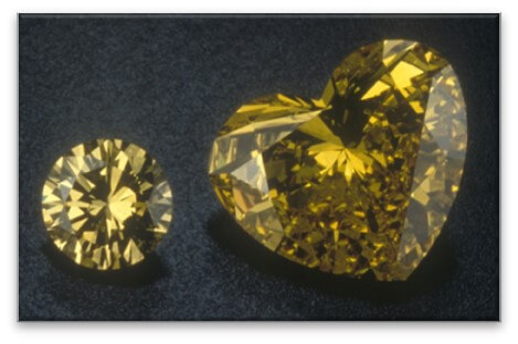 Two yellow gems with very different shapes