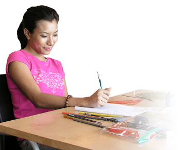 Picture of a woman happily sketch jewellery design on paper