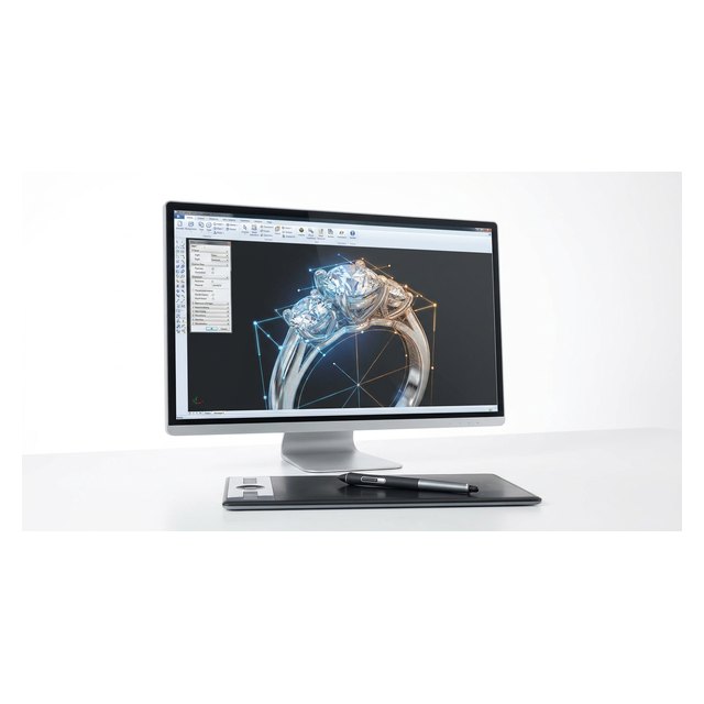 A monitor showing a 3D jewellery CAD ring model with a graphics stylus