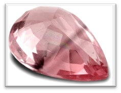 Picture of a pear shape pinkish uneven sapphire