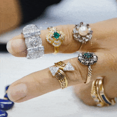Animated gif of sparkling jewellery on a finger