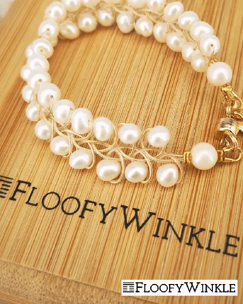 Image of Sky's white pearl necklace