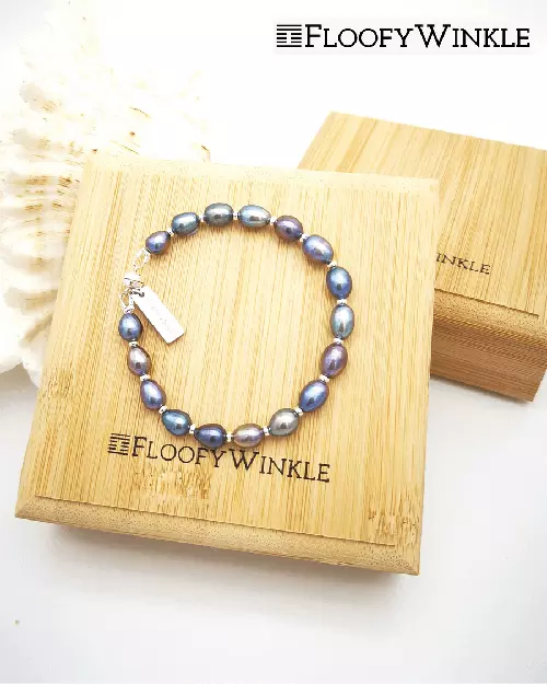 Image of sky's white pearl bracelet